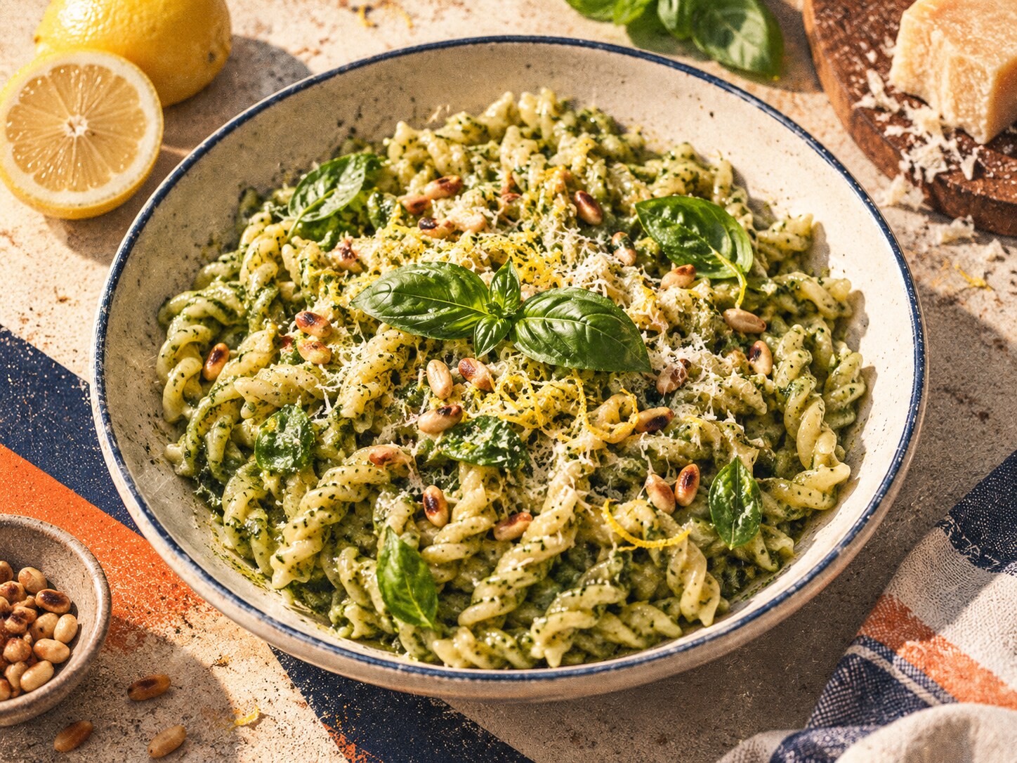 Lemony basil pesto pasta with Parmesan, toasted pine nuts, fresh basil, and lemon